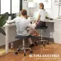Taburete Giratorio Ajustable Con Asiento Acolchado Reposapiés y Ruedas para Salones y Talleres 34x34x50-66 cm Negro Taburete Giratorio Ajustable Con Asiento Acolchado Reposapiés y Ruedas para Salones y Talleres 34x34x50-66 cm Negro