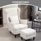 Sillón con Reposapiés Respaldo Alto Capitoné Patas de Madera Almohada Acolchada y Tapizado en Lino Beige