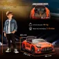 Coche Eléctrico para Niños Mercedes-AMG GT3 Evo con Mando a Distancia Motor Doble Ruedas Auxiliares Asa Música Naranja