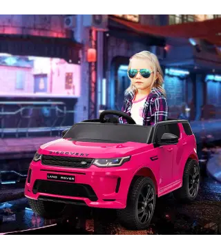 Coche Eléctrico para Niños con Licencia Land Rover Discovery Sport con Batería 12V Mando a Distancia Faros y Música Rosa