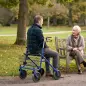Andador para Ancianos Plegable con Asiento 4 Ruedas Altura Ajustable Frenos de Maneta Cesta Bandeja Porta Bastón Azul